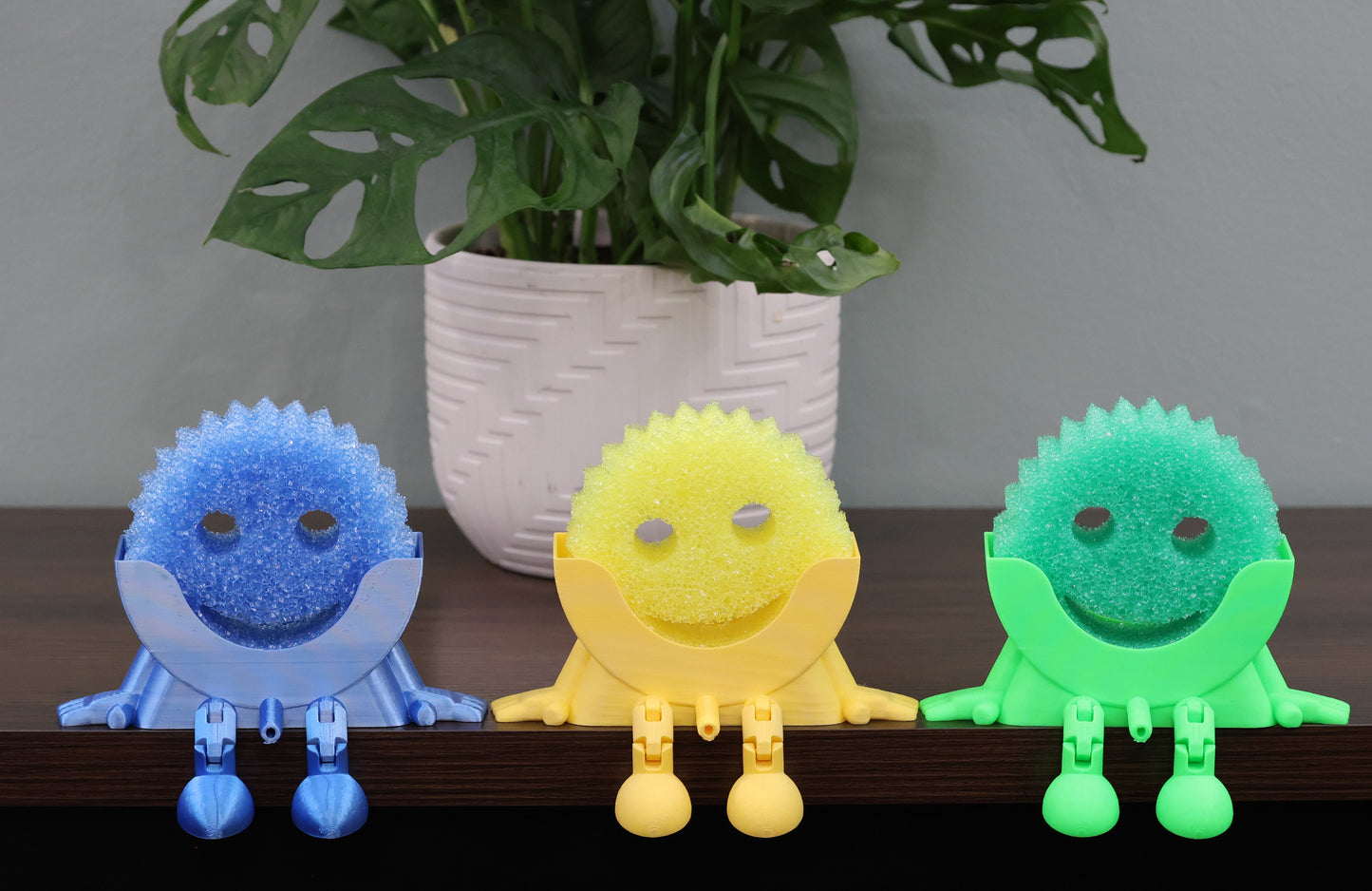 Three colorful sponge characters sponge daddy